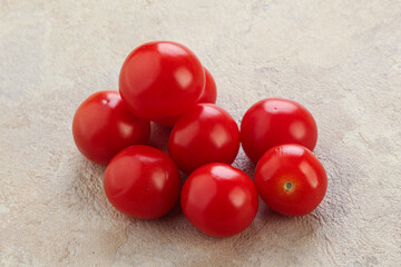 Ripe juicy cherry tomatoes heap