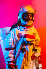 Cinematic image of an astronaut. Colorful portrait of a man with spacesuit