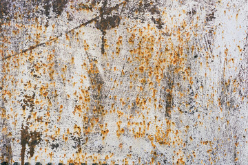 Old scratched and rusty painted metal surface, background texture. Texture of metal rusty wall