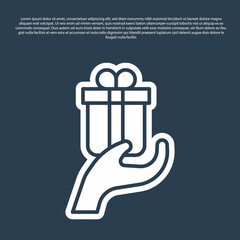 Blue line Give gift icon isolated on blue background. Gift in hand. The concept of giving and receiving a gift. Vector