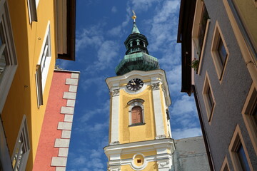 The colorful clock tower of the Parish church in Gmunden, Salzkammergut, Styria, Austria, Europe,...