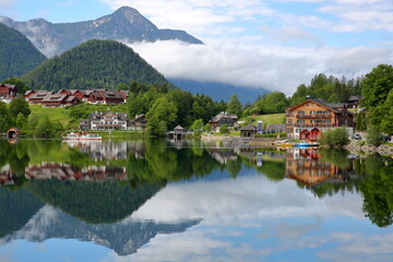 Reflections on Grundlsee lake (Eastern part) and colorful scenery, Salzkammergut, Styria, Austria, Europe