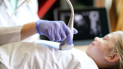 Diagnostic examination of internal organs in children using ultrasound machine
