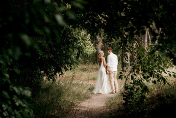 young couple of newlyweds on a walk