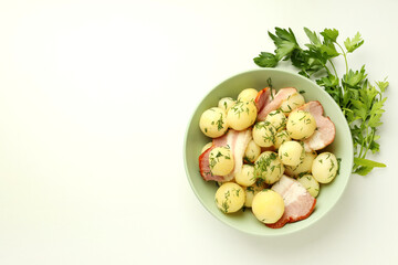 Concept of tasty food with boiled young potatoes, space for text