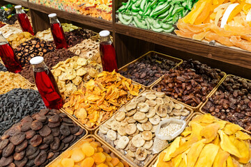 Traditional Azerbaijani cuisine ingredients dried fruit and herbs at the local market in Baku, Azerbaijan.