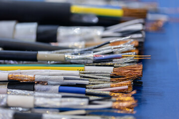 Fototapeta premium Set different copper wires on abstract background