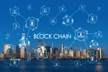 Skyline of New York City Financial Downtown Skyscrapers at night. Manhattan, NYC, USA. View from New Jersey. Decentralized economy. Blockchain, cryptography and cryptocurrency concept, hologram