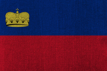 Patriotic classic denim background in colors of national flag. Liechtenstein