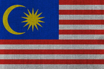 Patriotic classic denim background in colors of national flag. Malaysia