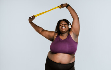 Young woman making pilates and functional training at the gym