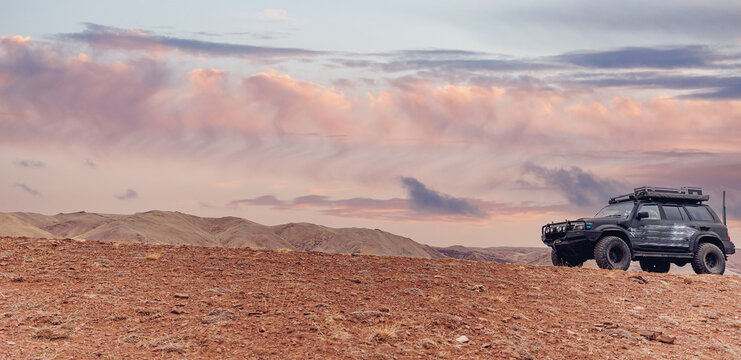 Concept travel offroad with car 4x4 mountains Altai Mars valley or sand Gobbi Mongolia