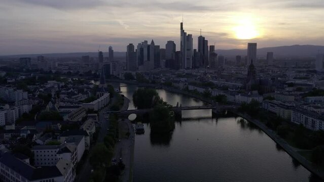 Frankfurt city Skyline from river main at sundown