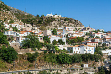 Coastal village of Dhermi with white houses on the slope of mountains. Albania