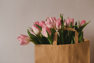 pink tulips in a bag