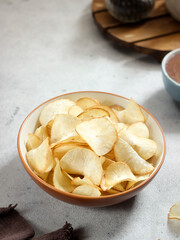 Keripik singkong. Cassava chips or tapioca chips is traditional snack from Java, made of cassava thinly sliced and fried.