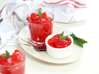 Manisan Kolang-Kaling, or preserved sugar palm fruit, tinted red, a traditional Indonesian typical refreshment and dessert during Ramadan month and in Idul Fitri or Hari Raya. Selective focus