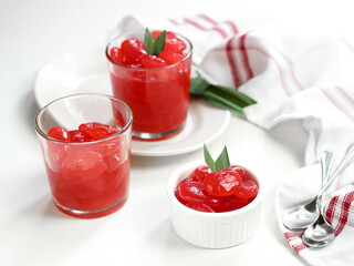 Manisan Kolang-Kaling, or preserved sugar palm fruit, tinted red, a traditional Indonesian typical refreshment and dessert during Ramadan month and in Idul Fitri or Hari Raya. Selective focus