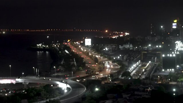 Slow-moving traffic at night at the Bandra Worli Sealink shot out of focus