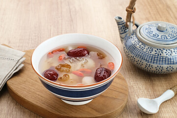 Peach Gum, Chinese traditional drink that contains peach gum, bird nest, red dates, snow fungus, goji berry, and rock sugar. 
