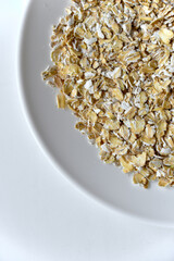 Oatmeal close-up on a white background