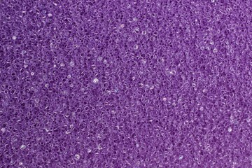 sponge for washing dishes purple color close-up