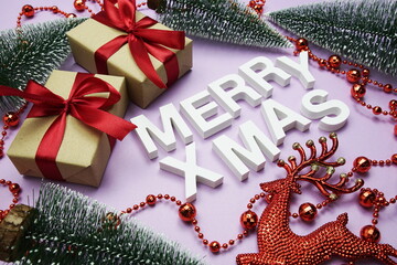 Merry XMAS alphabet letters with Christmas decorate on purple background