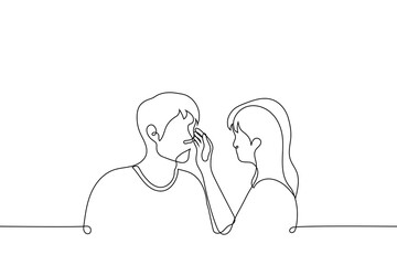 woman touches the man's face. couple looking at each other's eyes - one line drawing vector. woman wipes the tears of a man. concept skinship in a heterosexual couple