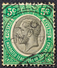 Stamp printed in Tanganyika shows image of The George V was King of the United Kingdom and the British Dominions, and Emperor of India, circa 1920.