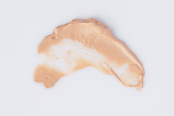 Make-up foundation bb-cream smudge powder creamy white isolated background