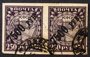 RUSSIA - CIRCA 1921: A stamp printed in the USSR Soviet Union shows symbols of industry. No...