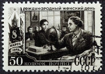USSR - CIRCA 1949: stamp printed in the USSR Russia shows a woman teacher with inscription...
