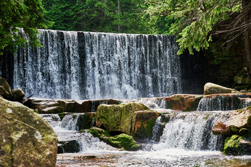 Waterfall on Lomnica river in Karpacz mountains in Poland, Beautiful nature landscape