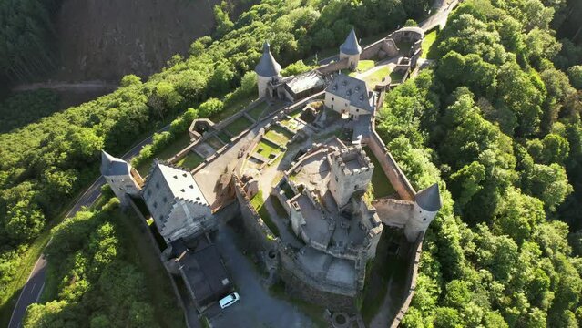 Bourscheid Castle is located near the village of Bourscheid in the north of Luxembourg. It is a medieval castle dating back to Roman times, and it has a circular wall with multiple watch towers.
