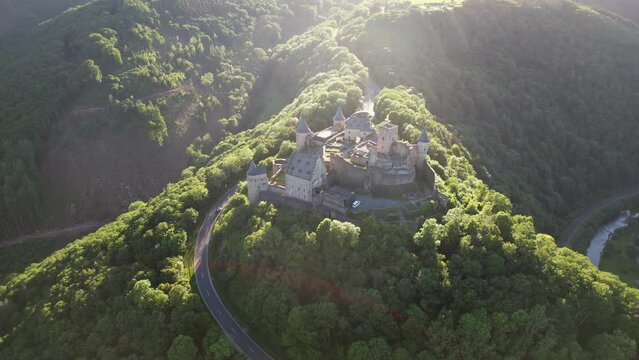 Bourscheid Castle is located near the village of Bourscheid in the north of Luxembourg. It is a medieval castle dating back to Roman times, and it has a circular wall with multiple watch towers.