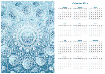 Calendar for 2023 year with mandala pattern in blue colors. Week starts on sunday.