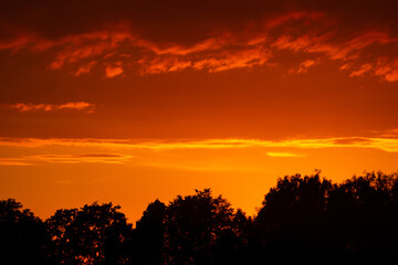 Fototapeta premium Fiery orange sunset sky. Beautiful sky.