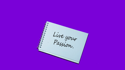 Hand writing note Live your Passion notebook. lifestyle, advice, support motivational positive words are written on a wooden background. Business, signs, quotes, symbols, concepts. Copy space.