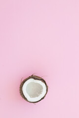 Obraz na płótnie Canvas Fresh coconut on a pink background