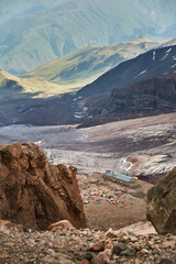 Mt Kazbeg base camp with view on Gergeti glacier. Meteostation in Kazbek, Georgia. Mount kazbek...