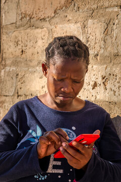 African Woman On The Phone