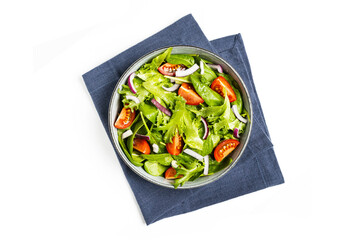 Summre green salad in white bowl plate on grey table
