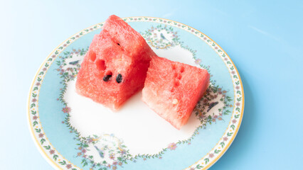 a refreshing plate to eat on a hot summer day a fresh ice-cold crimson juicy watermelon