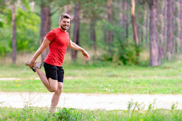 Athletic man runner stretching legs before run. Healthy, fitness, wellness lifestyle. Sport,...