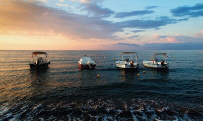 Anchor of a fishing boat in the setting sun on the island of Corfu in the resort of Roda, Greece.