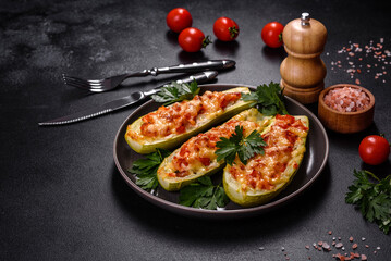 Baked stuffed zucchini boats with minced chicken mushrooms and vegetables with cheese