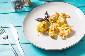 Fried zucchini flowers stuffed with cream cheese, ricotta, tasty Italian dish