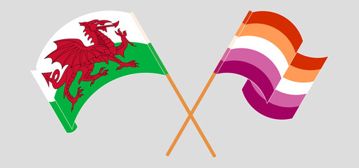 Crossed and waving flags of Wales and Lesbian Pride