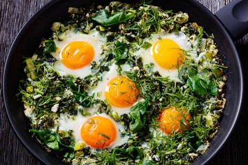 green shakshuka in frying pan, top view