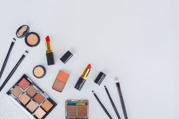 Flat lay composition with makeup cosmotic on white background